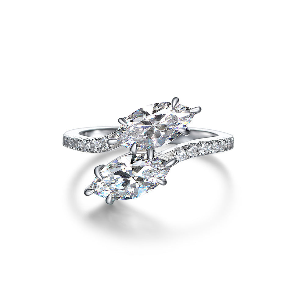 Anillo de plata de ley 925 entrelazado con doble zirconia cúbica blanca cortada en marquesa