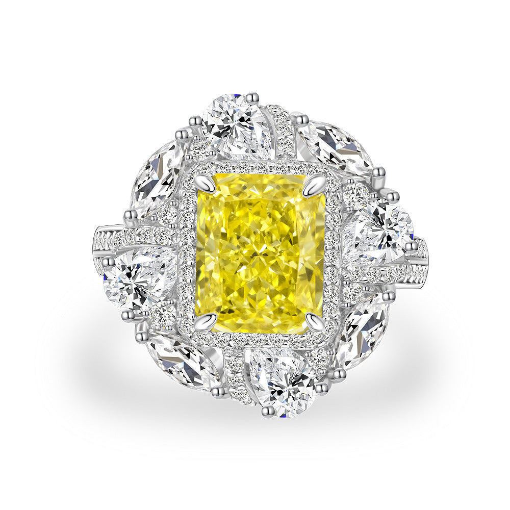 Anillo moderno de plata de ley 925 con circonia amarilla rectangular y halo