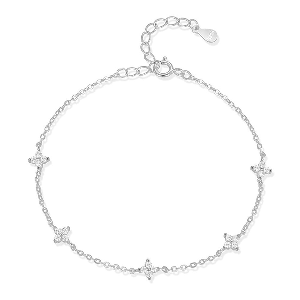 Pulsera de cadena con estaciones delicada de plata S925 con circonia cúbica y flor de cuatro pétalos