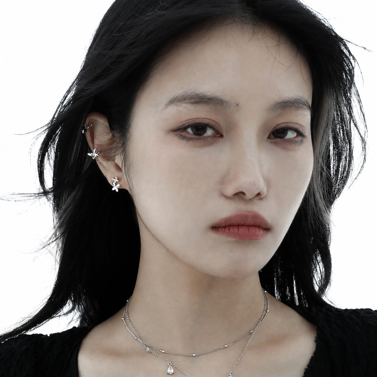 Elegant and Stylish Earrings Featuring a Multi Faceted Butterfly Silhouette in Minimalist 925 Sterling Silver Stud Earrings