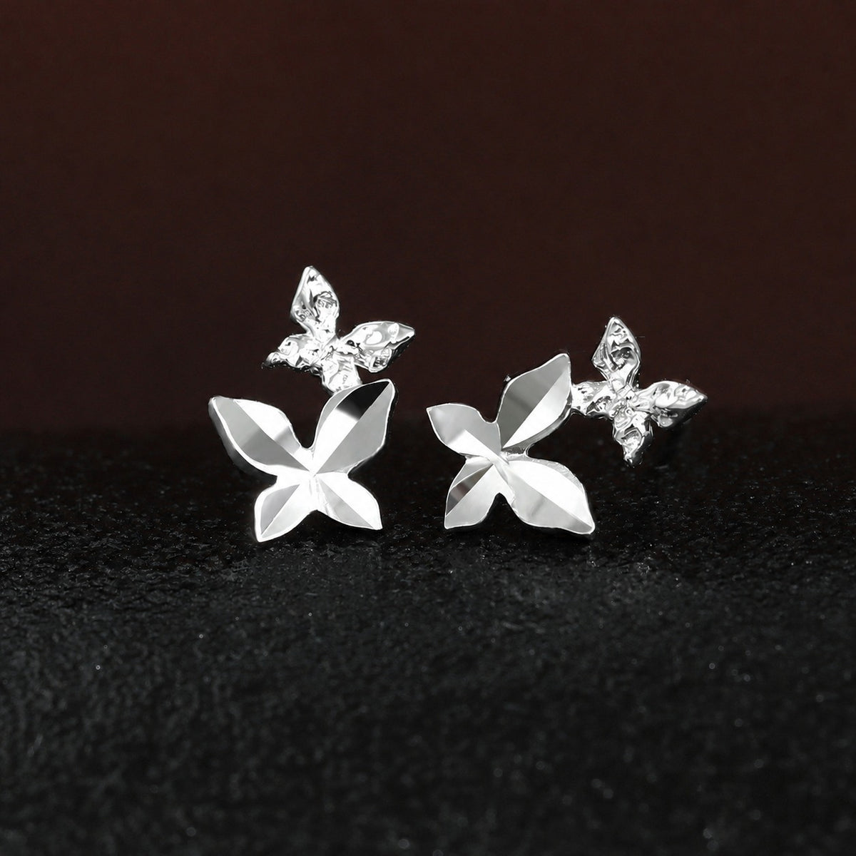 Elegant and Stylish Earrings Featuring a Multi Faceted Butterfly Silhouette in Minimalist 925 Sterling Silver Stud Earrings