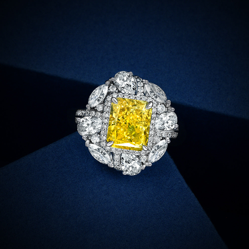 Anillo moderno de plata de ley 925 con circonia amarilla rectangular y halo